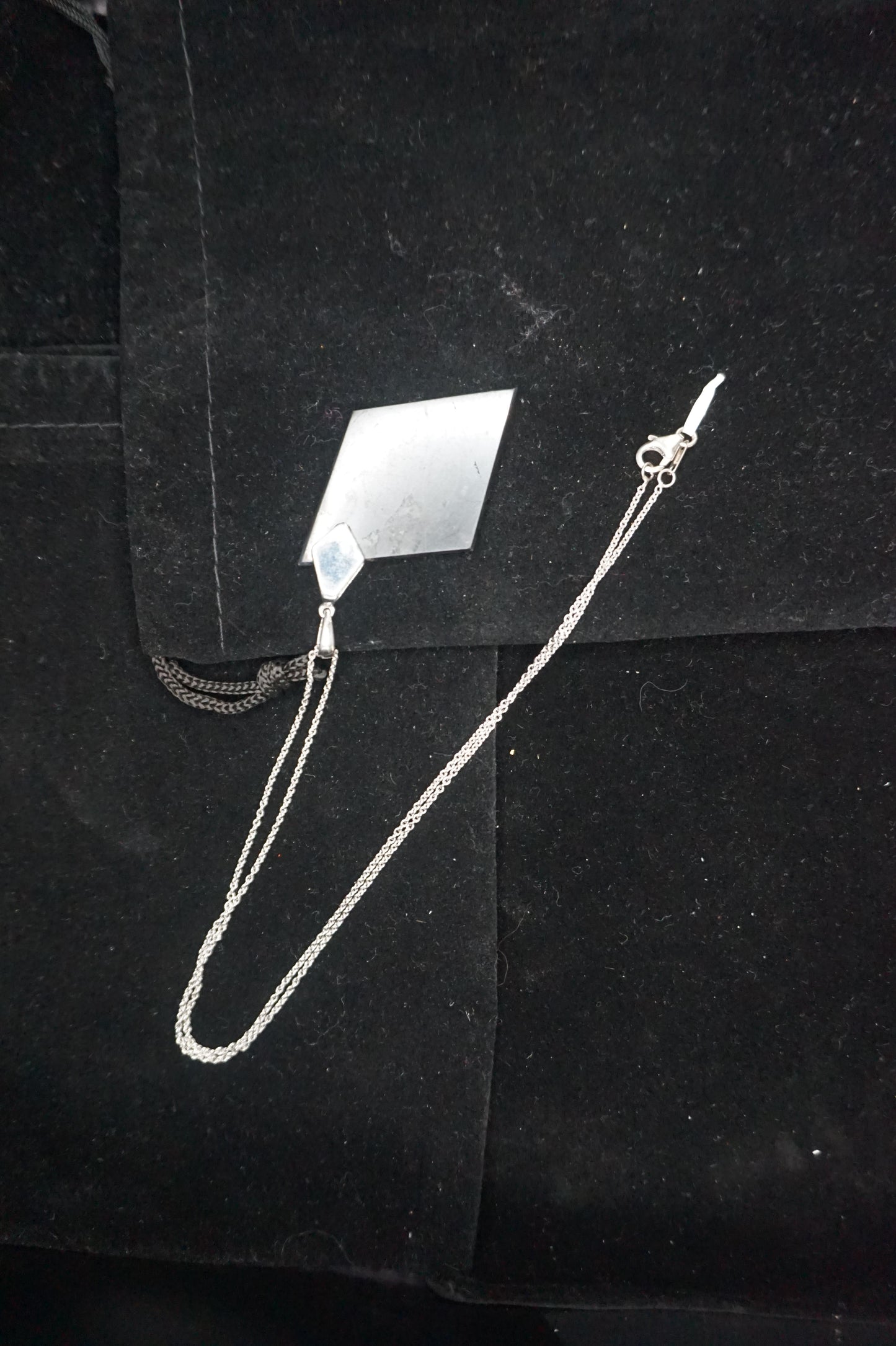 20 in silver chain with Dimond shungite pendant