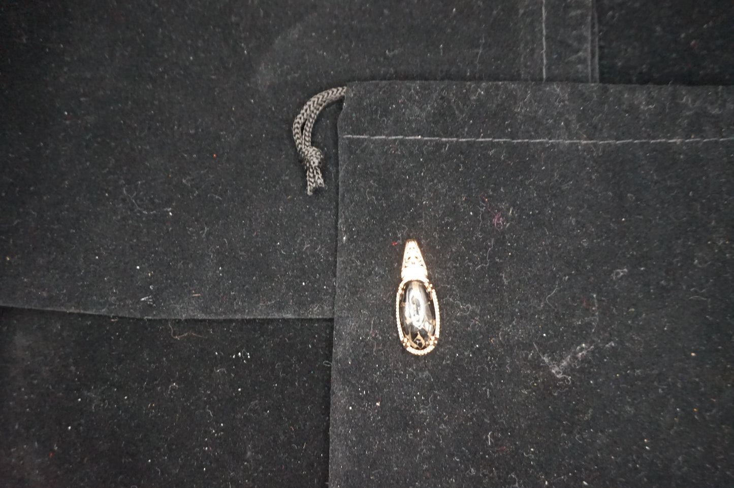 Magnetic Shungite Pendant Gold Over Copper Setting.